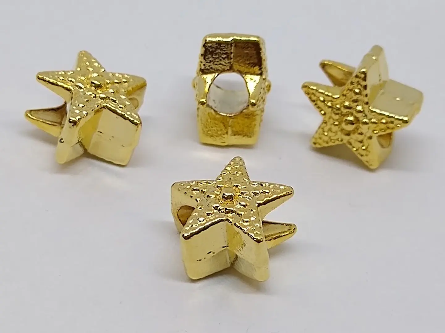 ESTRELLA BAÑO DE ORO T5986       1