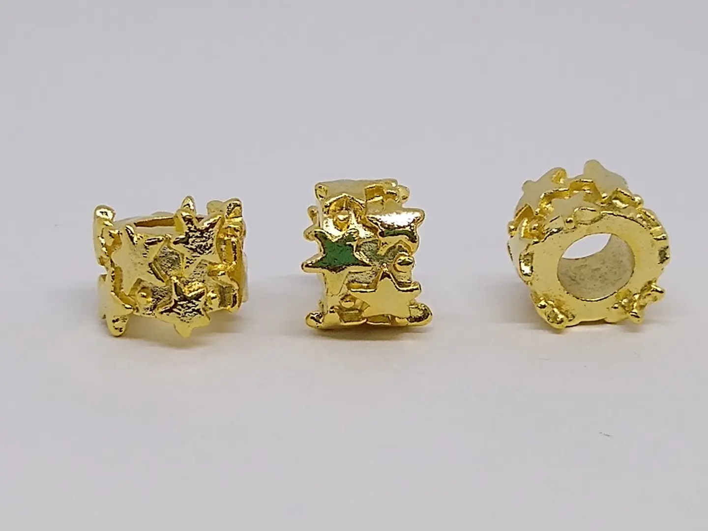 SEPARADOR ESTRELLAS BAÑO DE ORO T5945                          1
