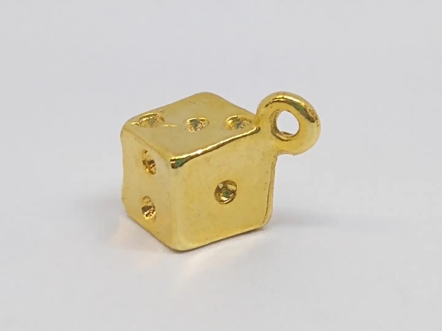 DADO BAÑO DE ORO T1832EM                         1