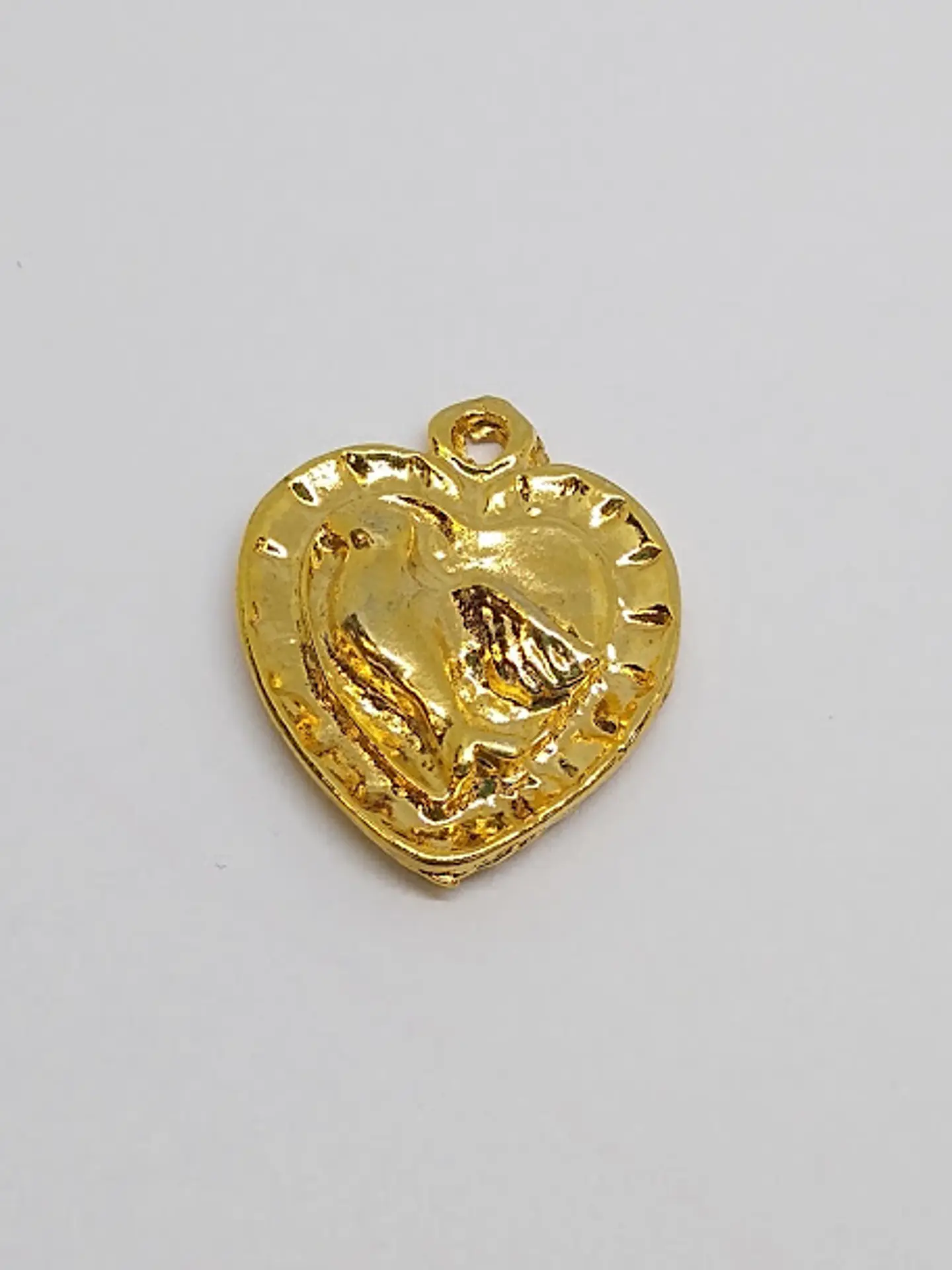 CORAZÓN CON AVE BAÑO DE ORO T2902                         1