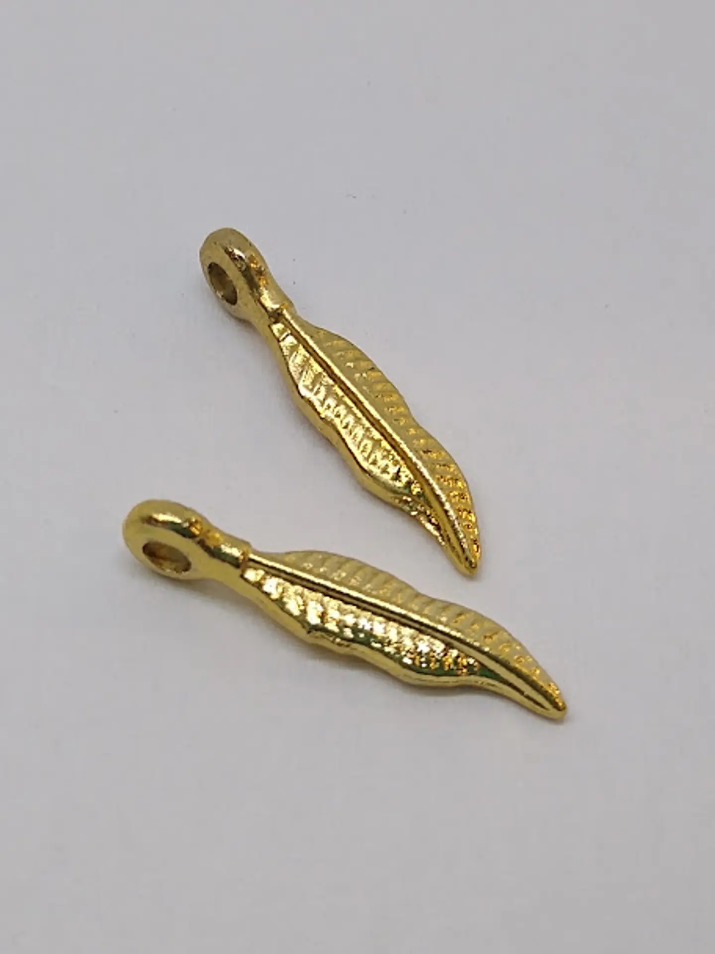 PLUMA BAÑO DE ORO T2501                                1