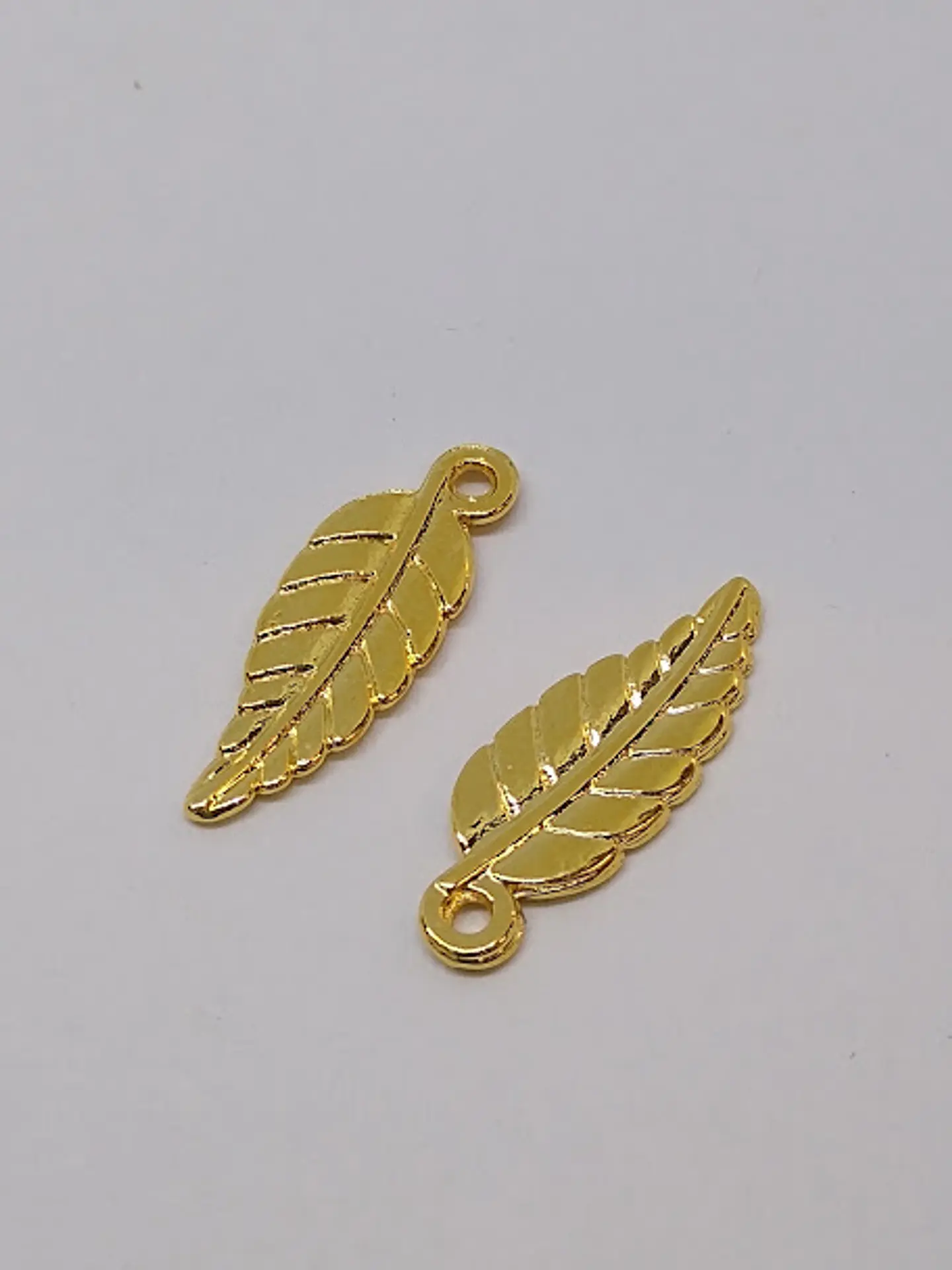 DIJE HOJA ZAMAK BAÑO DE ORO                                         1