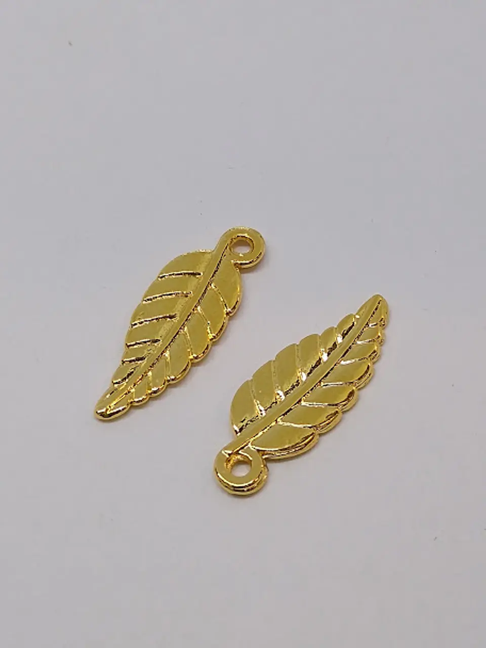 DIJE HOJA ZAMAK BAÑO DE ORO                                         1