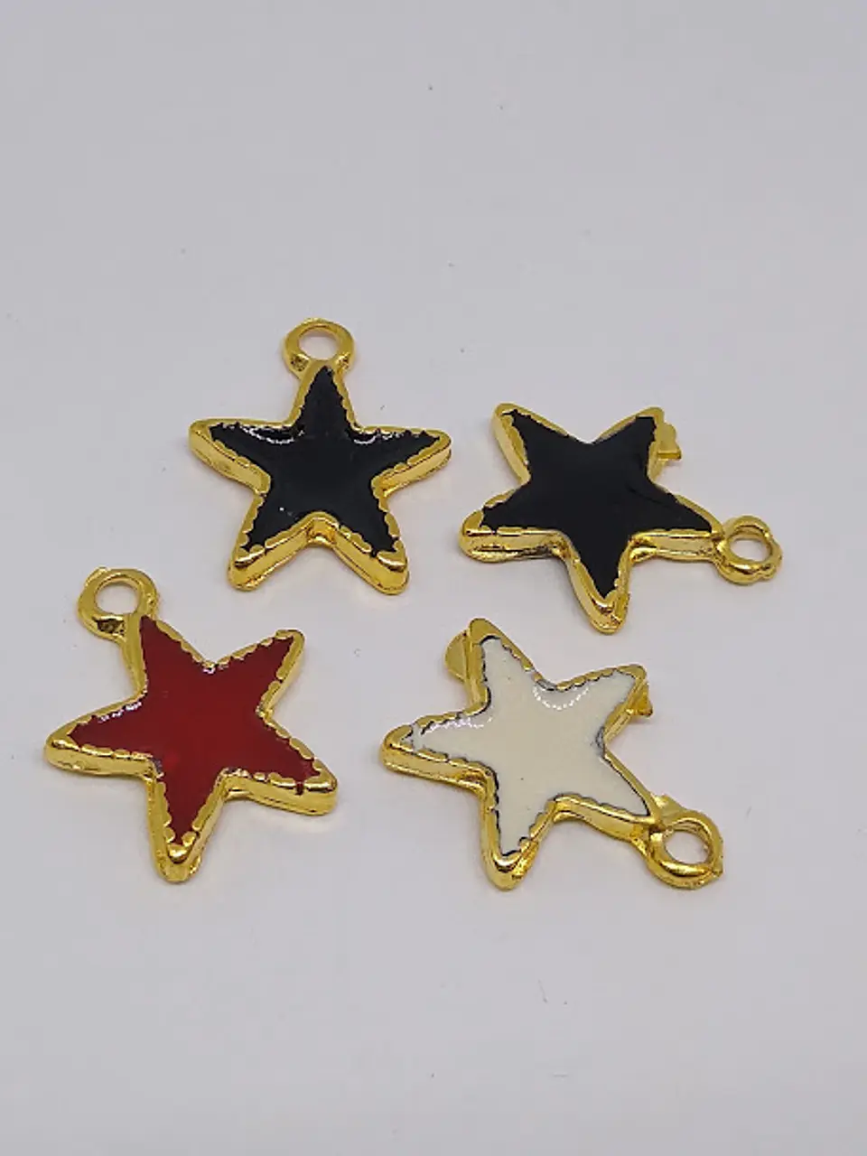 DIJE ESTRELLA RESINA BAÑO DE ORO                 1
