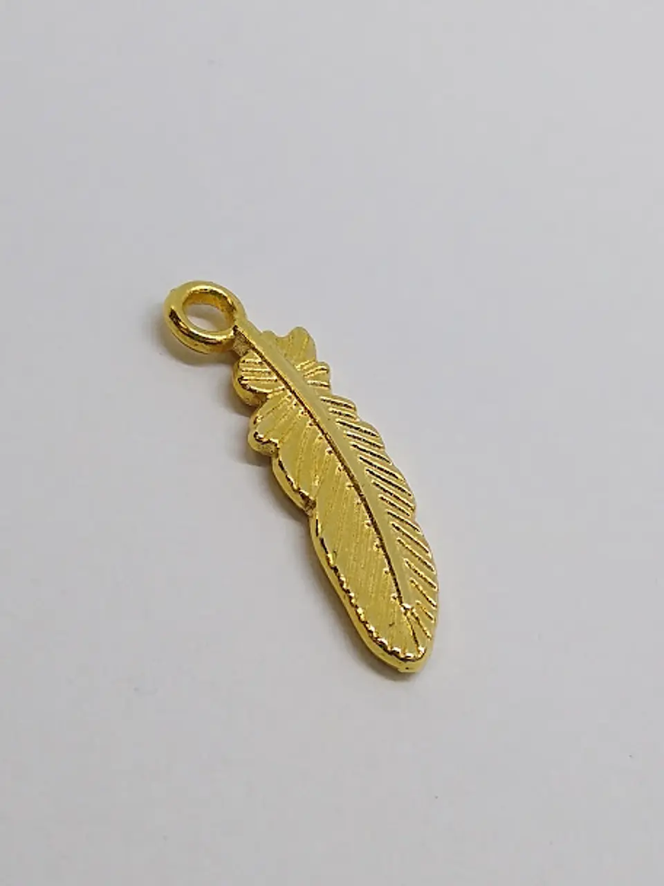 PLUMA BAÑO DE ORO T2004                         1