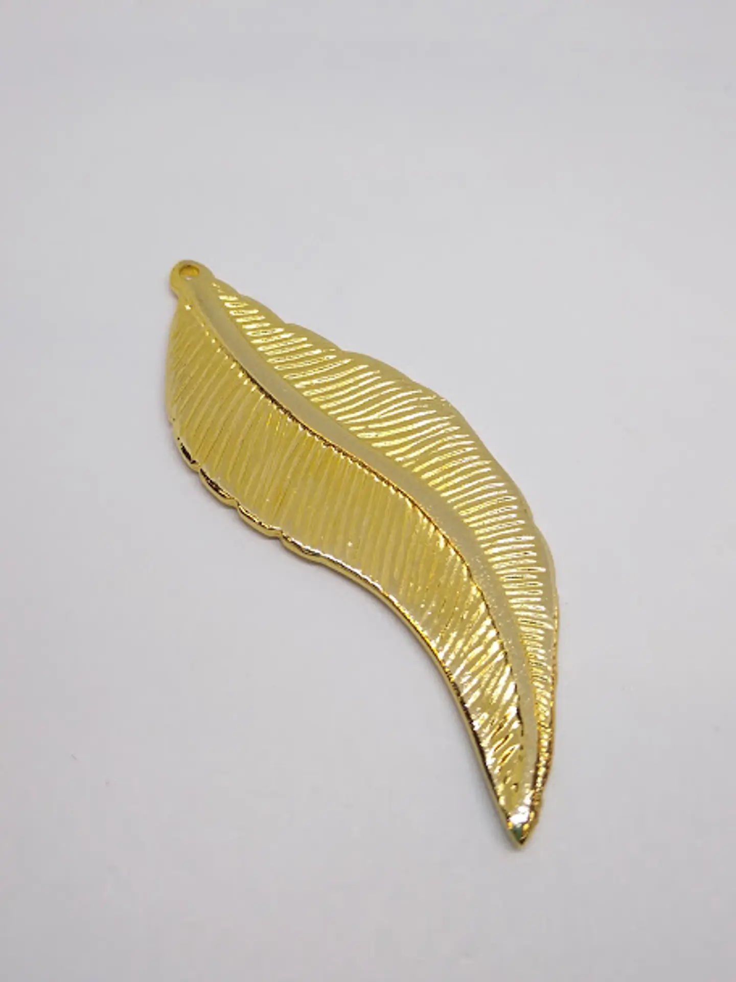 PLUMA BAÑO DE ORO T2199                              1