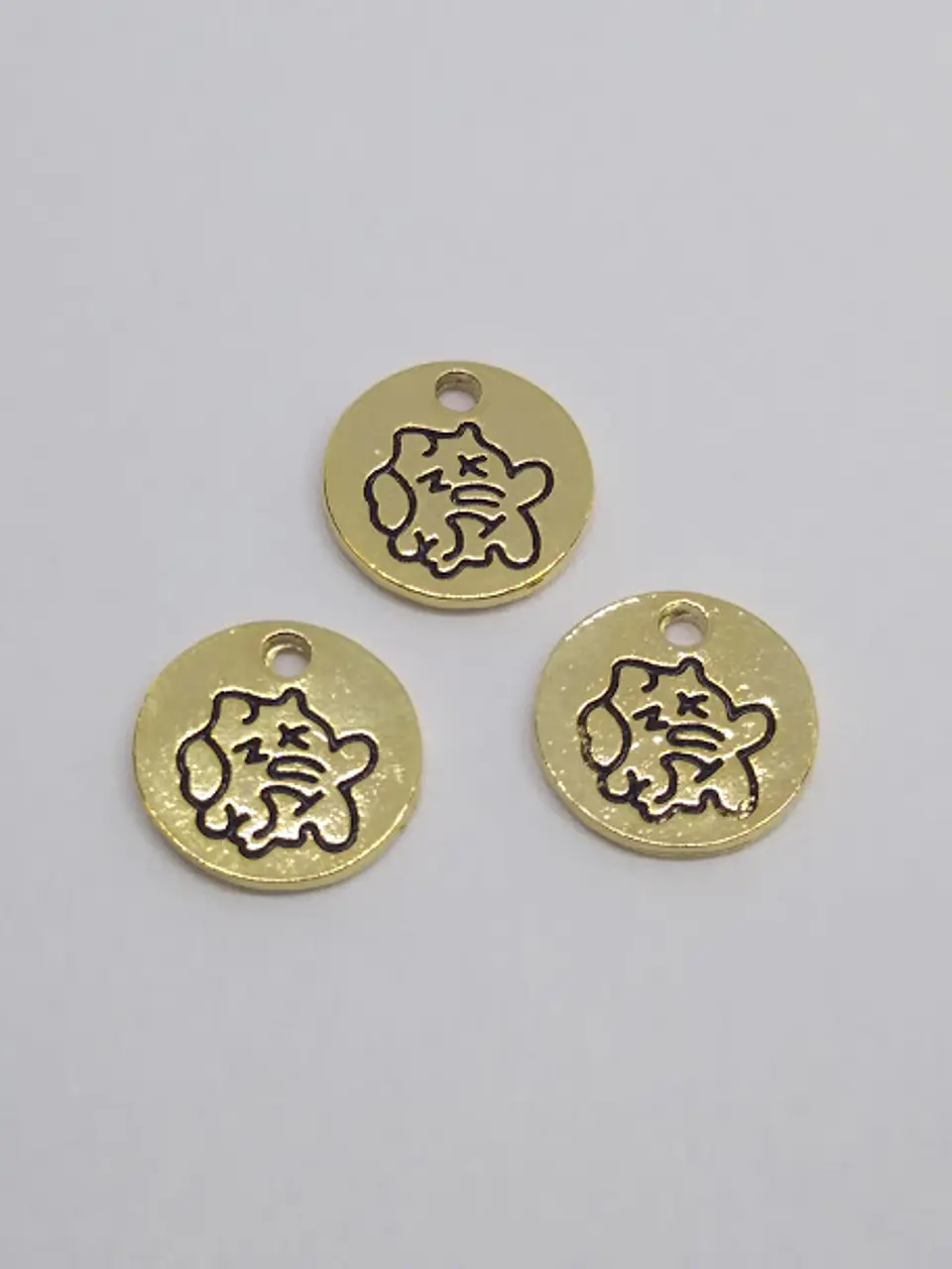 MONEDA PEZ BAÑO DE ORO T5116                   1