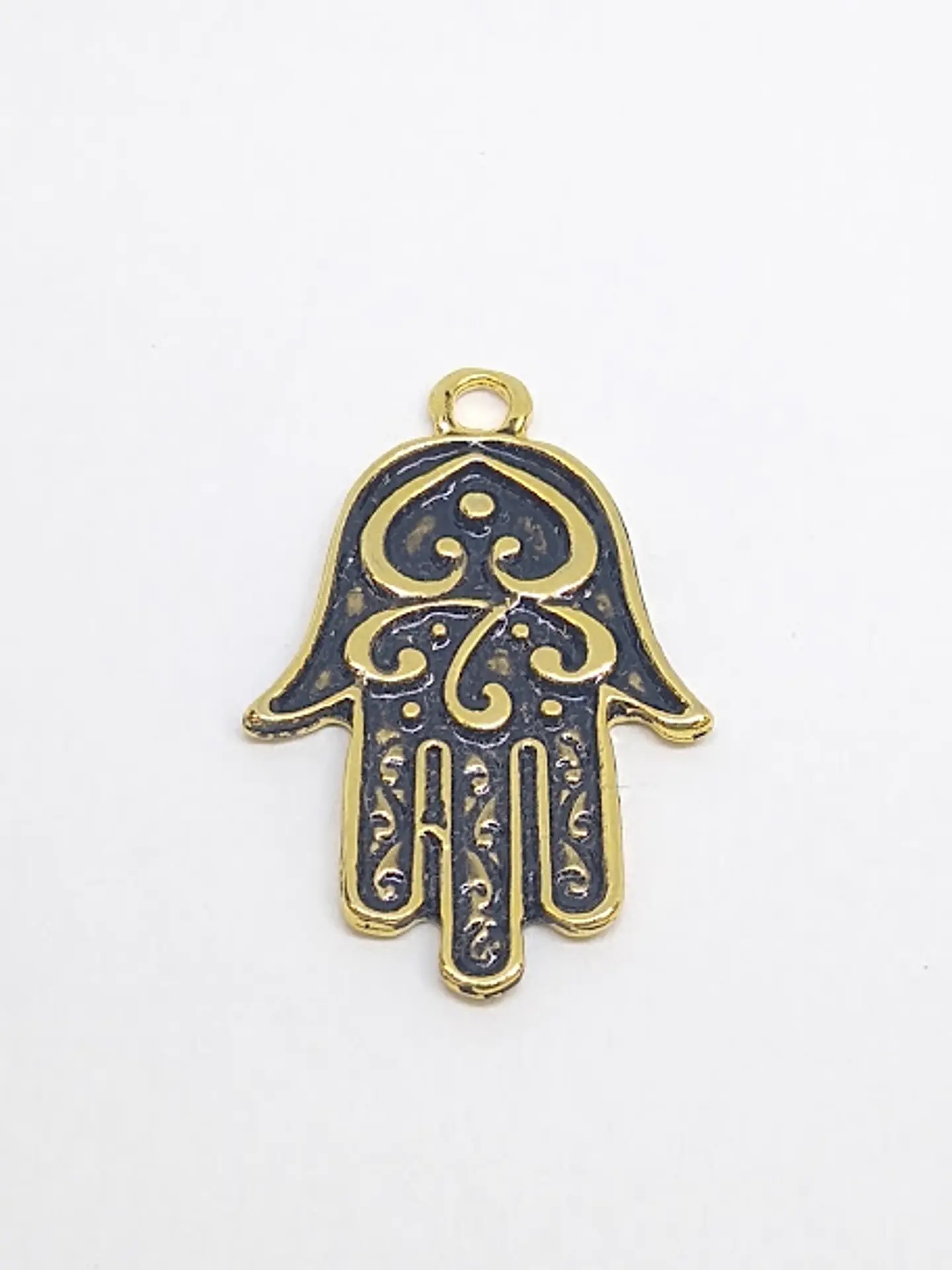 MANO HAMSA BAÑO DE ORO T2588                            1