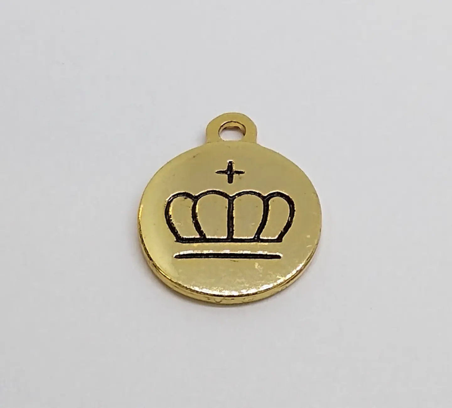 PLACA CORONA BAÑO DE ORO T3174                               1