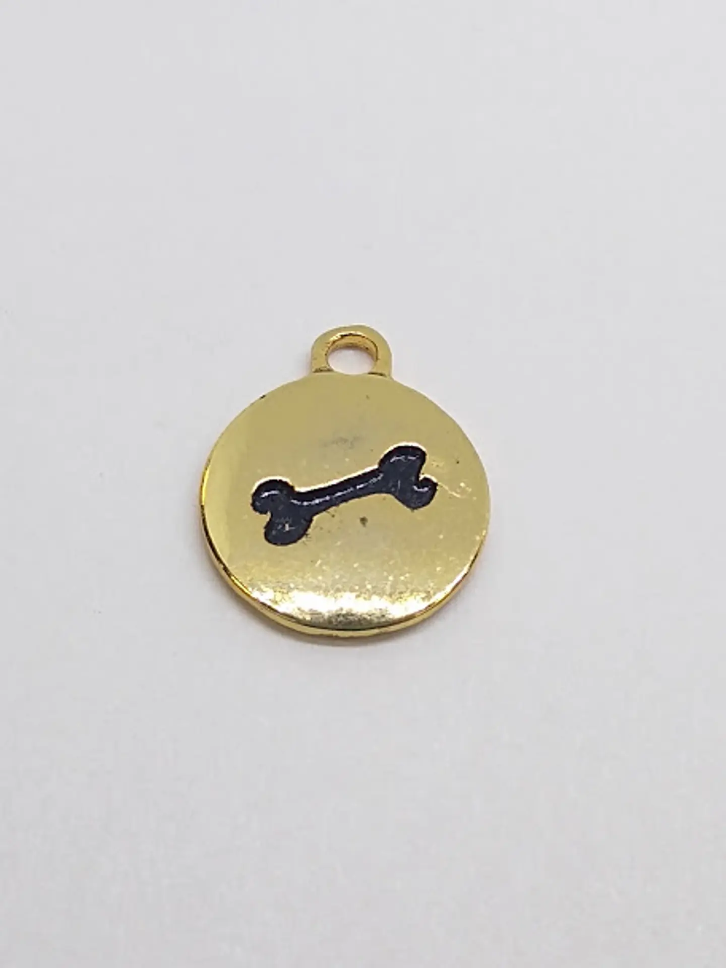 MONEDA HUESO BAÑO DE ORO T3169                                      1
