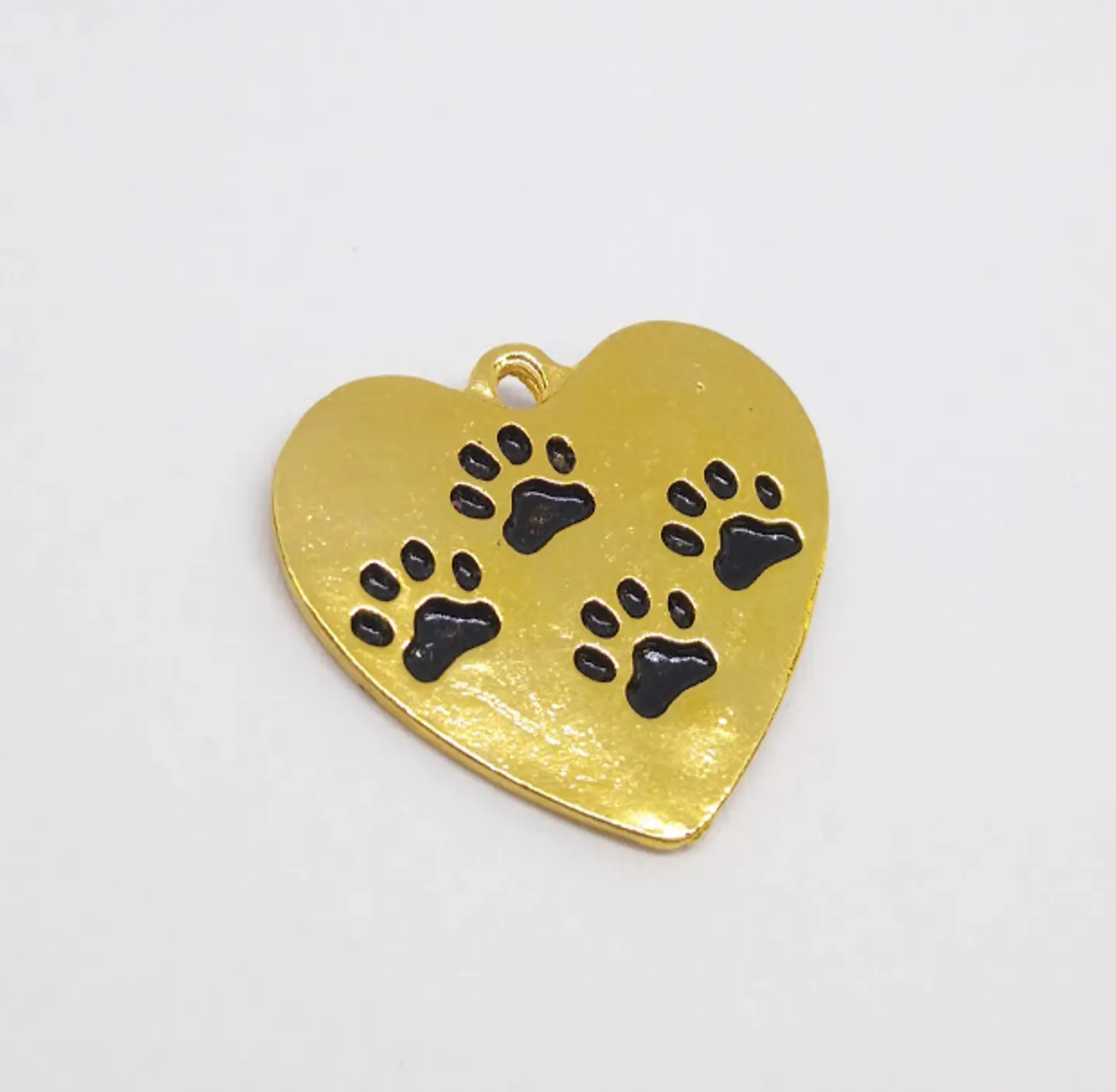 CORAZÓN HUELLAS BAÑO DE ORO T3263                                       1