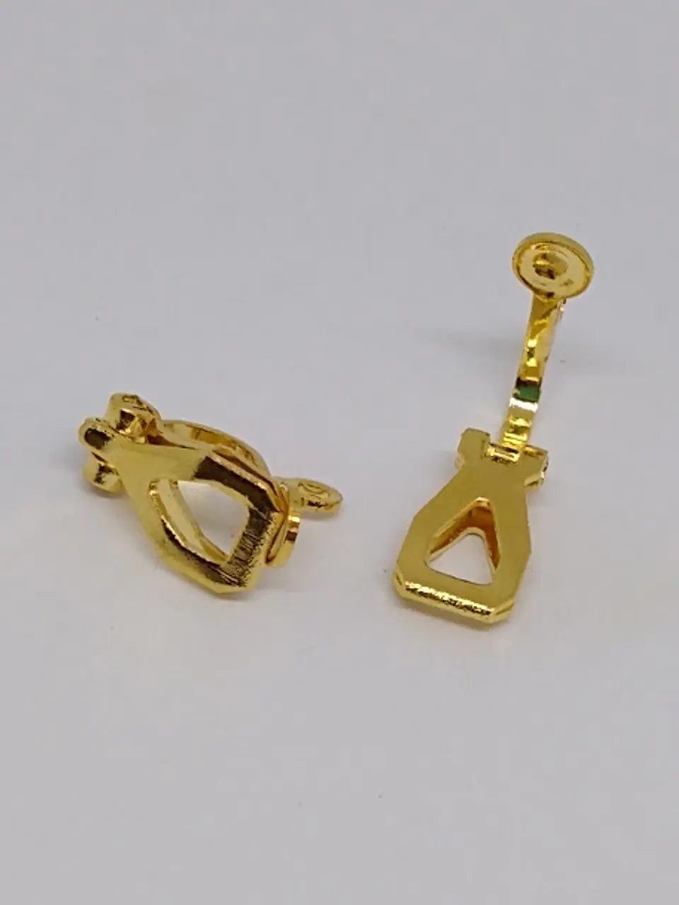 TOPO PINZA BAÑO DE ORO T5882                      1