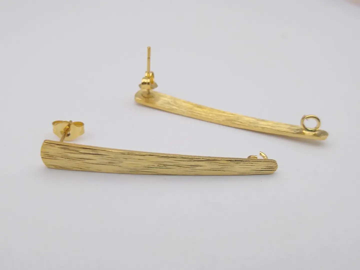 TOPO TRIÁNGULO BAÑO DE ORO T5824             1