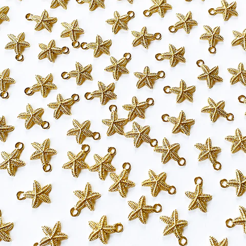 DIJE ESTRELLA DE MAR BAÑO DE ORO 