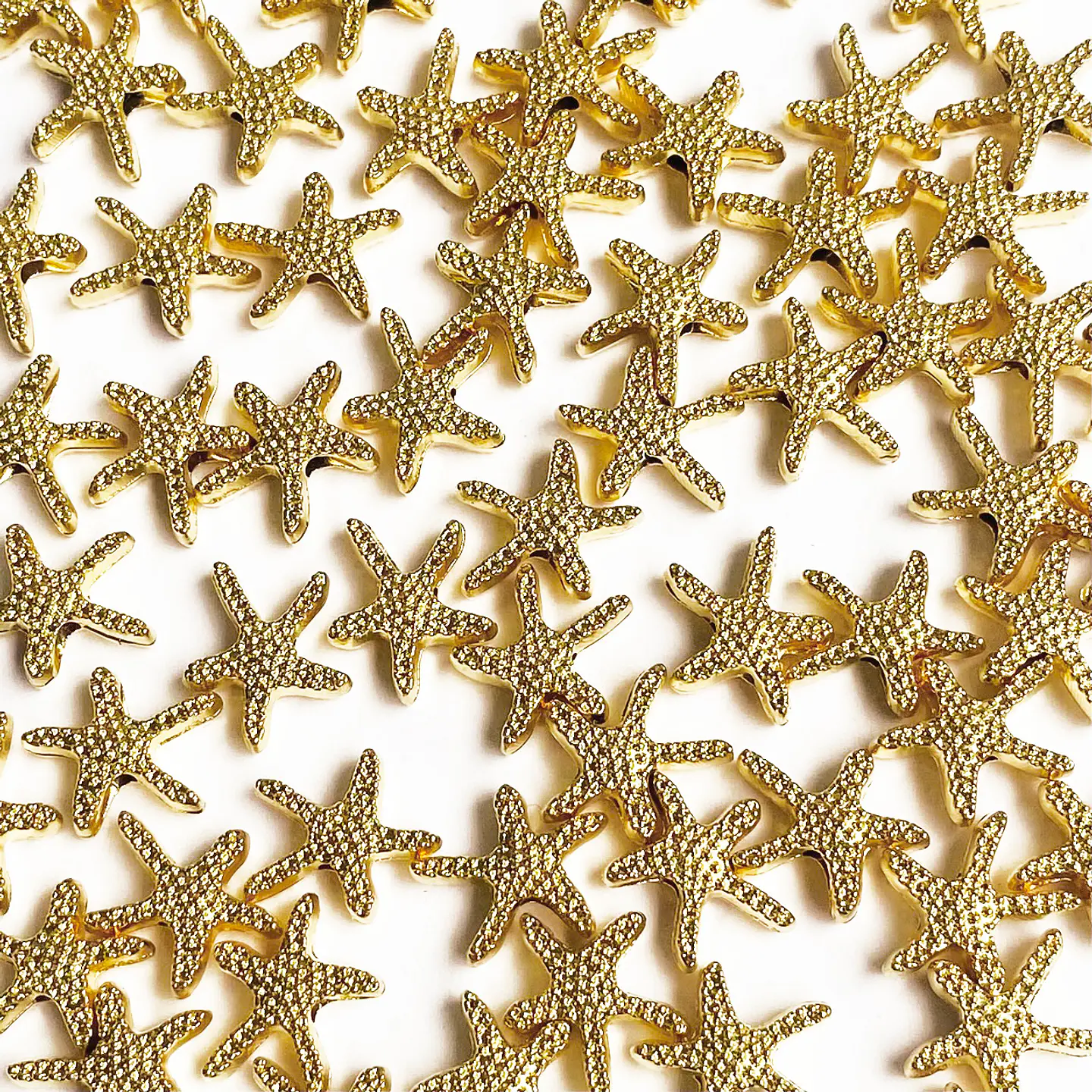 ESTRELLA ✦ DE MAR BAÑO DE ORO 11*12 MM 1