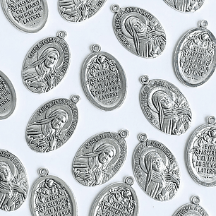 MEDALLA ✦ SANTA TERESITA DEL NIÑO JESÚS EN ZAMAK