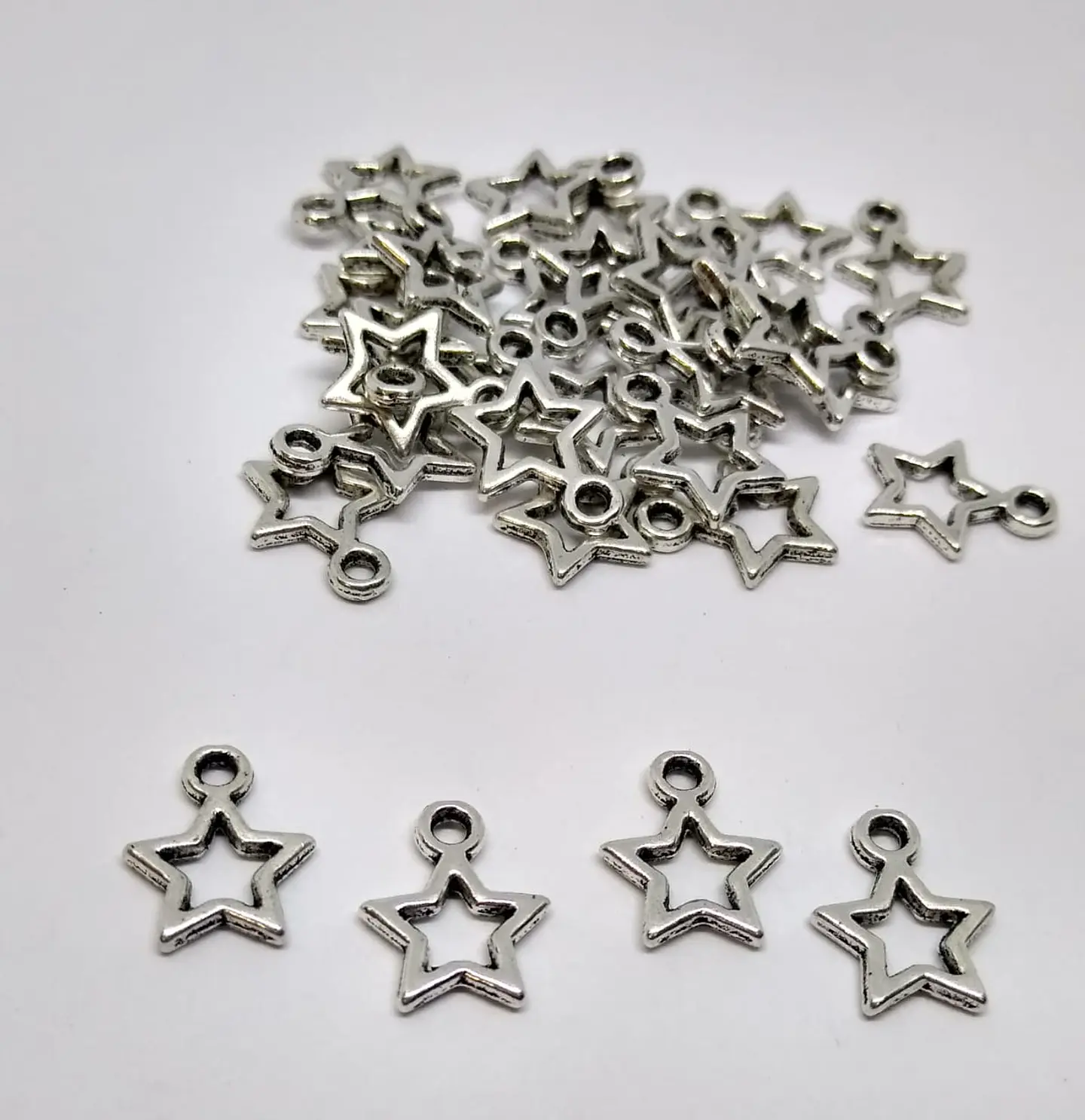 DIJE ESTRELLA ZAMAK A0037 1