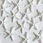 DIJE ✦ ESTRELLA DE MAR PLASTICA - Miniatura 1