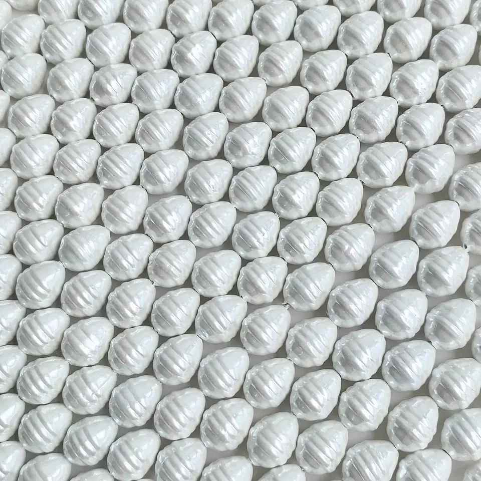 PERLA ✦ SHELL TROMPO 10*13 MM 1
