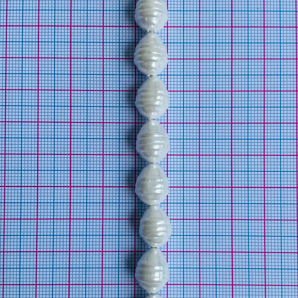 PERLA ✦ SHELL TROMPO 10*13 MM 2