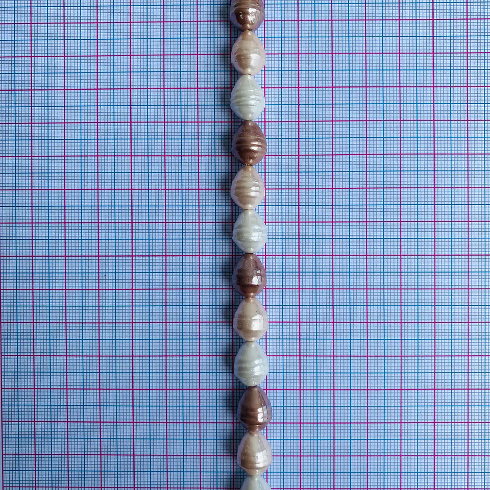 PERLA ✦ SHELL TROMPO 10*13 MM 2