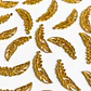 Dije Pluma Curva • Baño de Oro • 15x40 mm                        - thumbnail 1