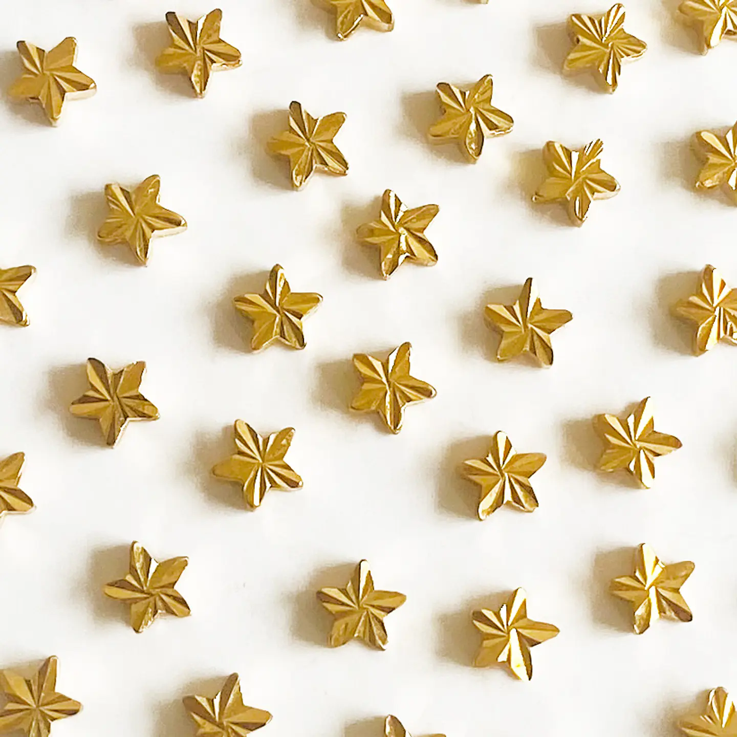 Separador Estrella Destello • Baño de Oro • 6x6 mm 1