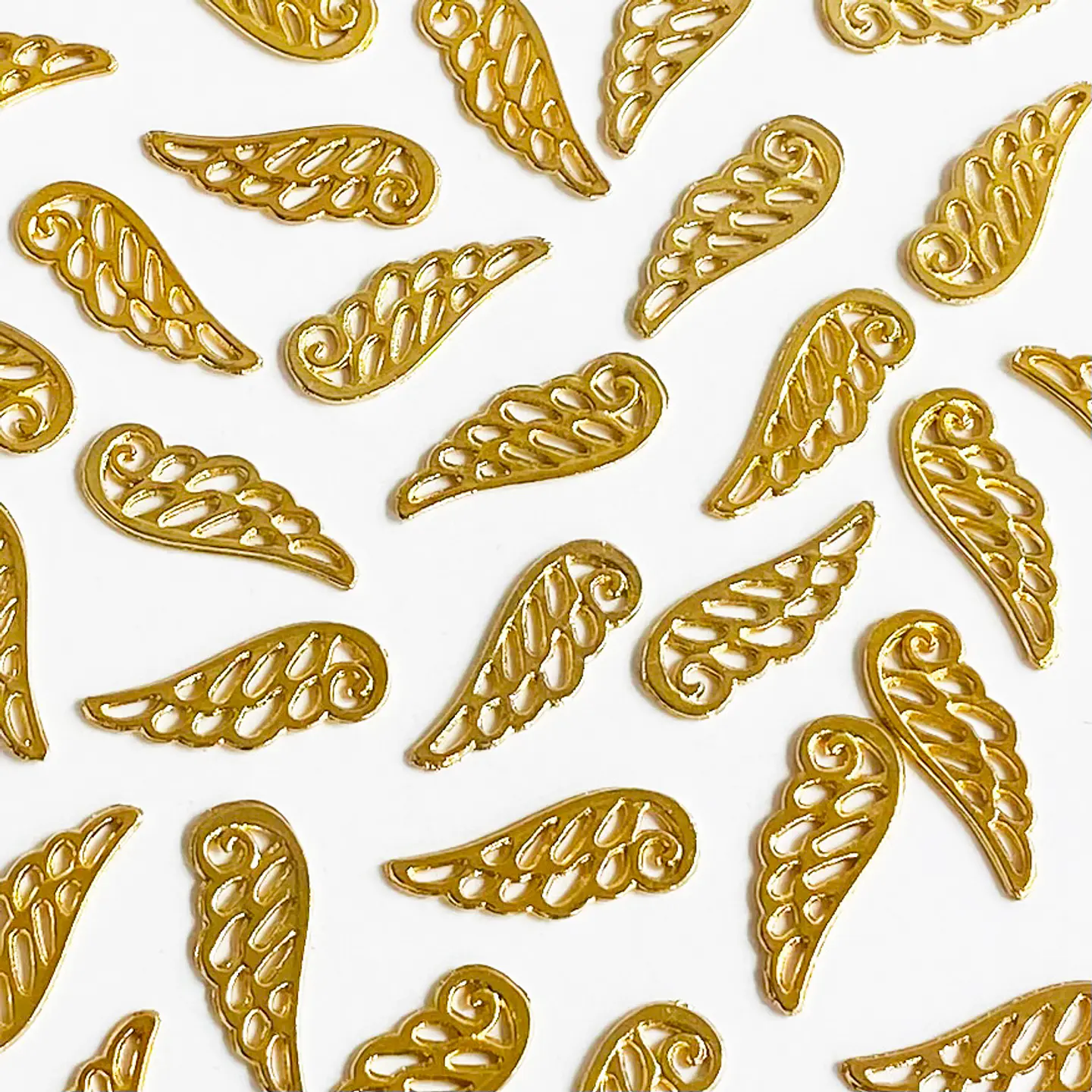 Dije Ala de Ángel • Baño de Oro • 9x24 mm                  1