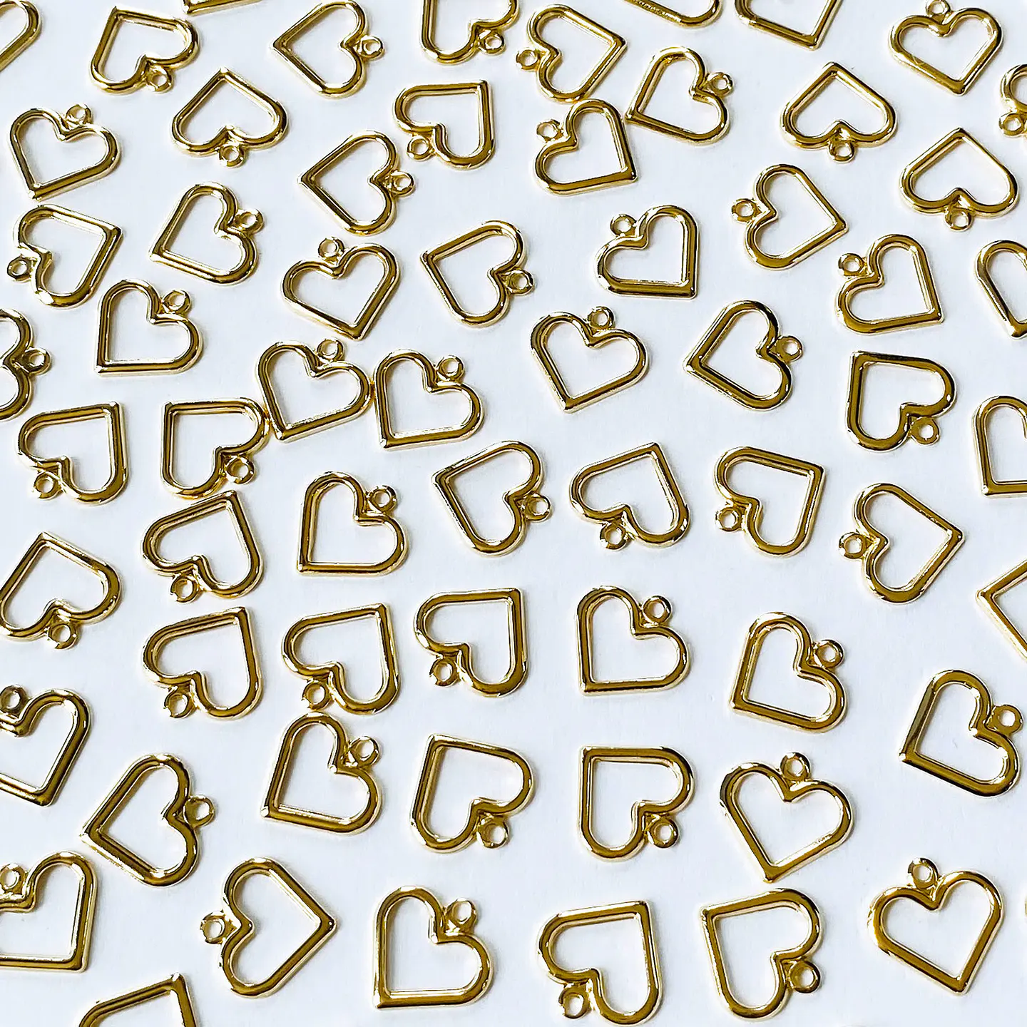 Mini Dije Silueta Corazón • Baño de Oro • 14x14 mm 1