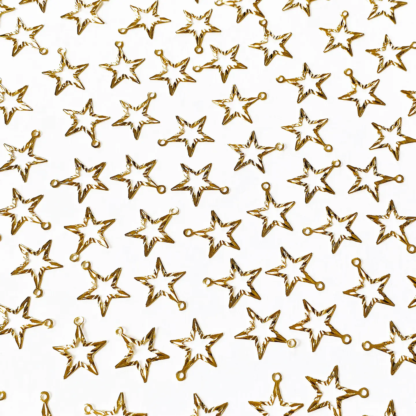 Mini Dije Estrella Silueta • Baño de Oro • 14x16 mm 1