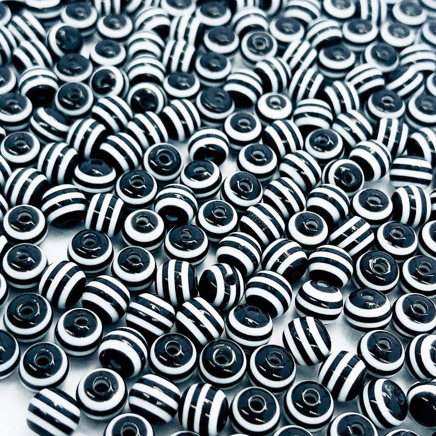 Cuenta Bola Nylon Rayada Negra • Acrílica • 6 mm 1