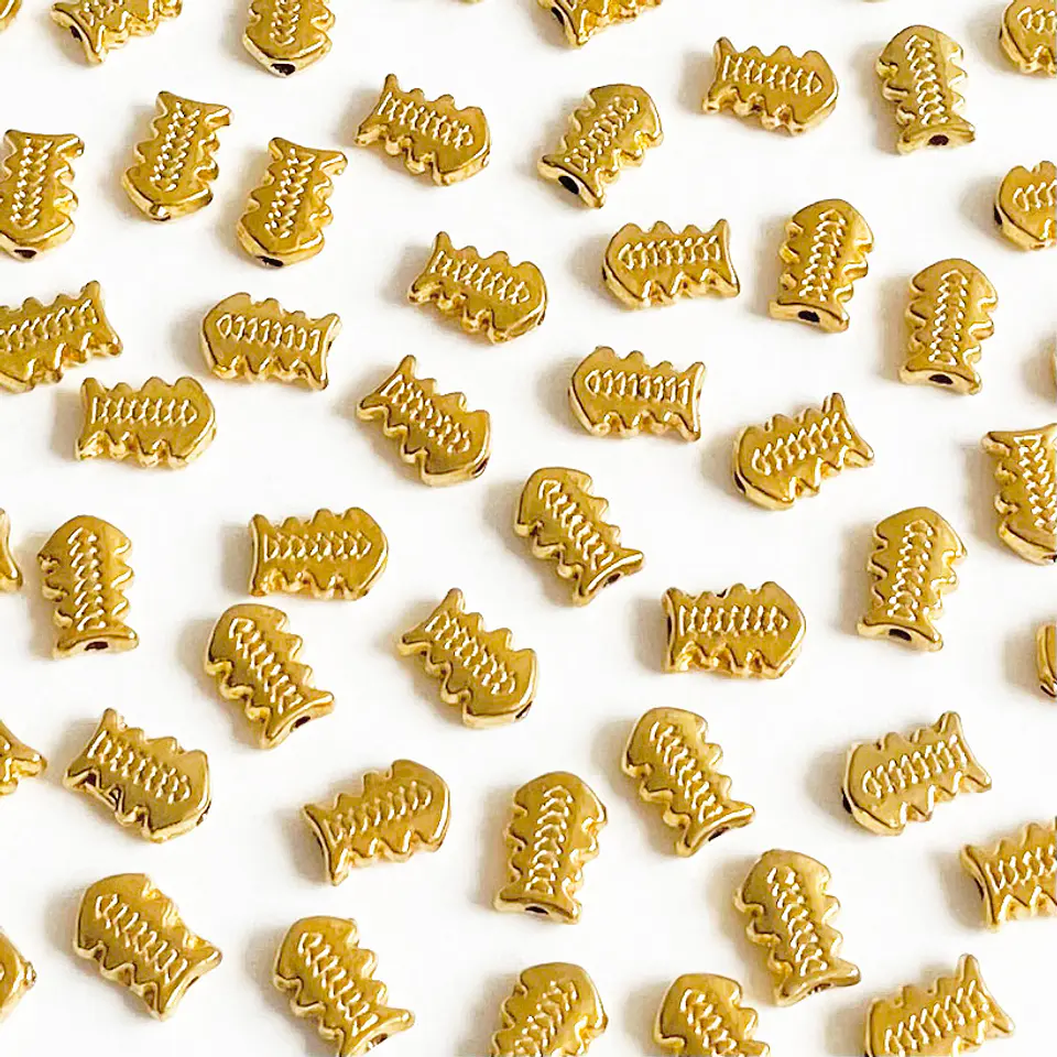 Pasador Pez Estilizado • Baño de Oro • 8x6 mm 1