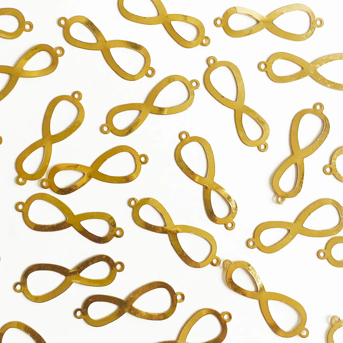 Dije Conector Infinito • Baño de Oro • 30x12 mm 1