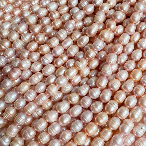 Perla de Rio Arroz • 9x10 mm