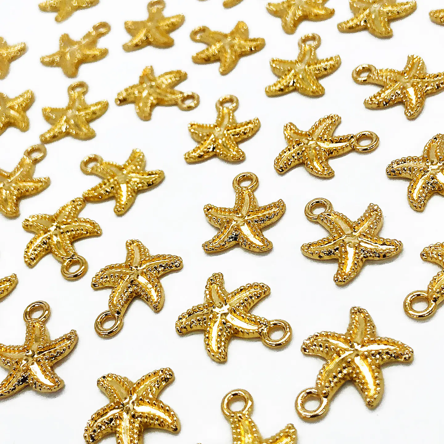 Dije Estrella de Mar Relieve • Baño de Oro • 18x15 mm 1