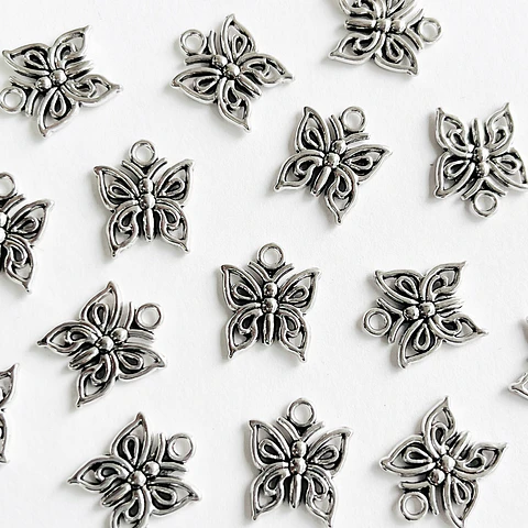Dije Mariposa Calada • Zamak • 15x13 mm
