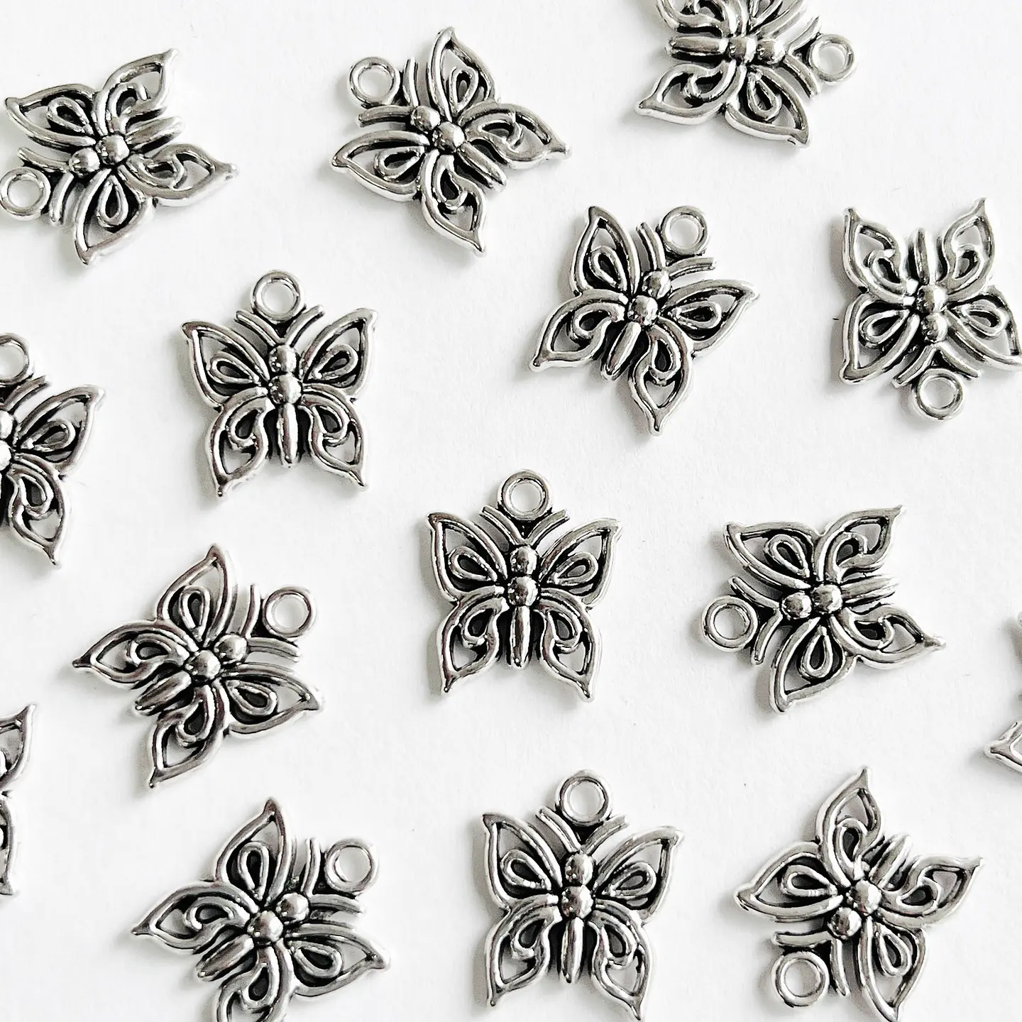 Dije Mariposa Calada • Zamak • 15x13 mm 1