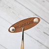 Etiquetas ovaladas para pegar con remaches