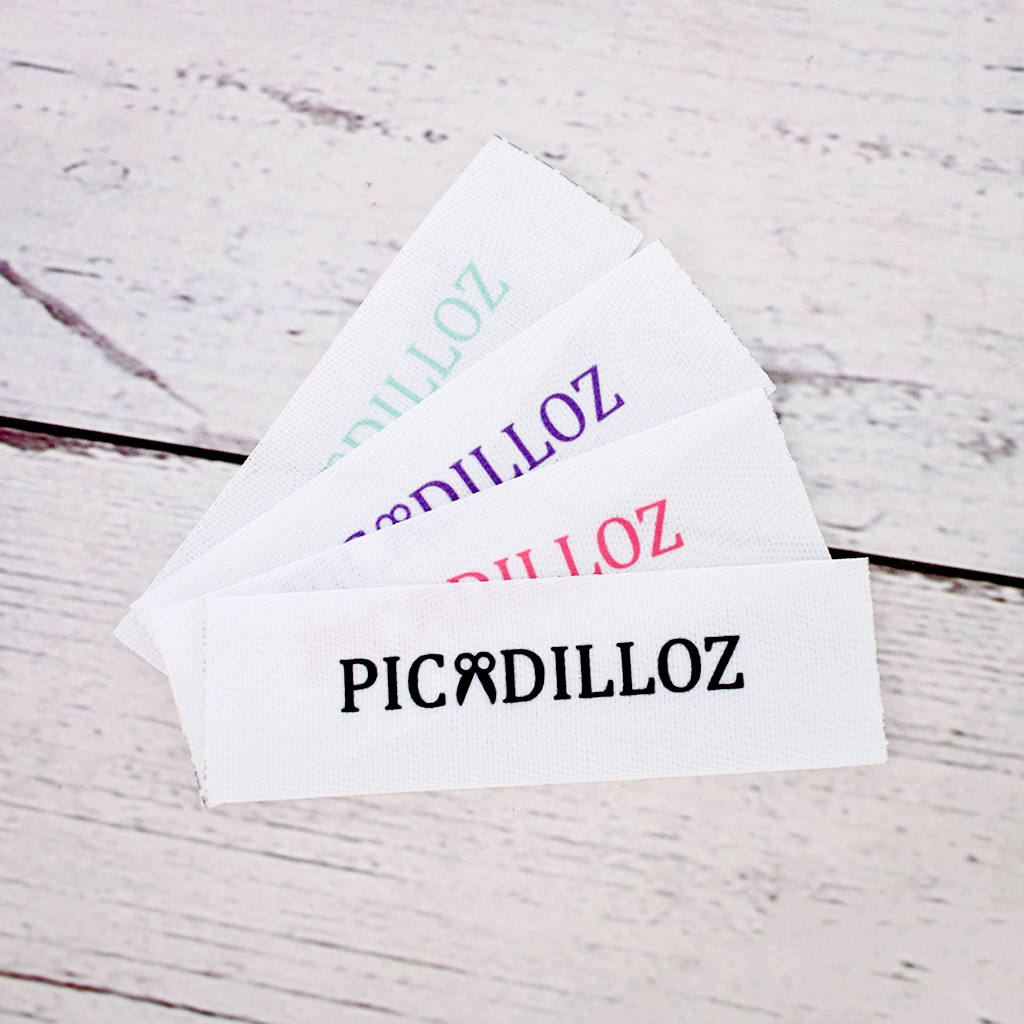 100 Etiquetas Espiga de 2 Cms Personalizadas fondo blanco, cortadas y selladas