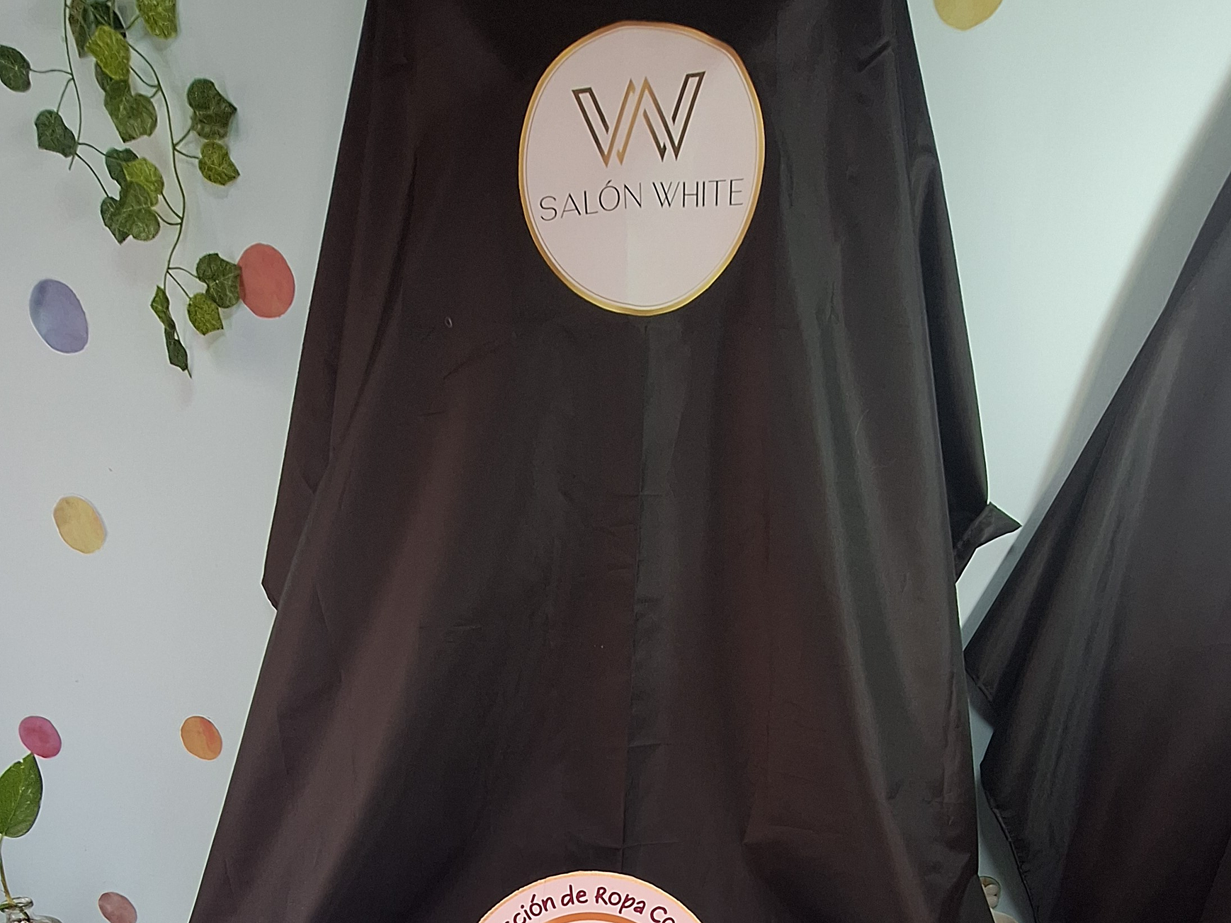 Capas de peluquería antifluidos 13