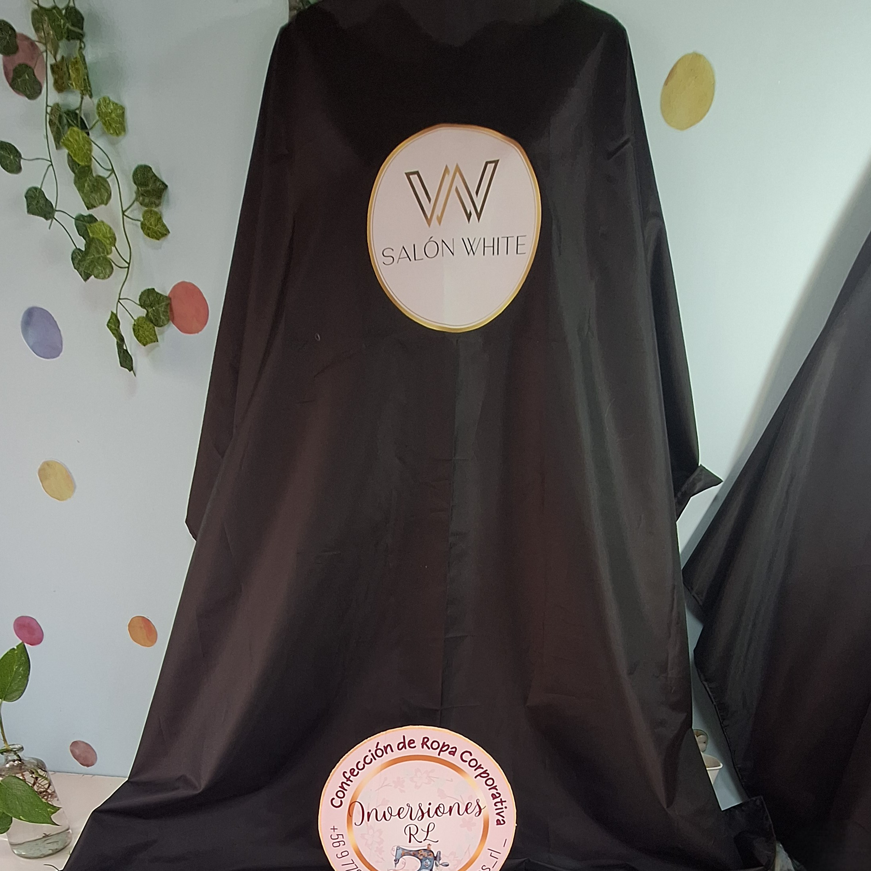 Capas de peluquería antifluidos 13