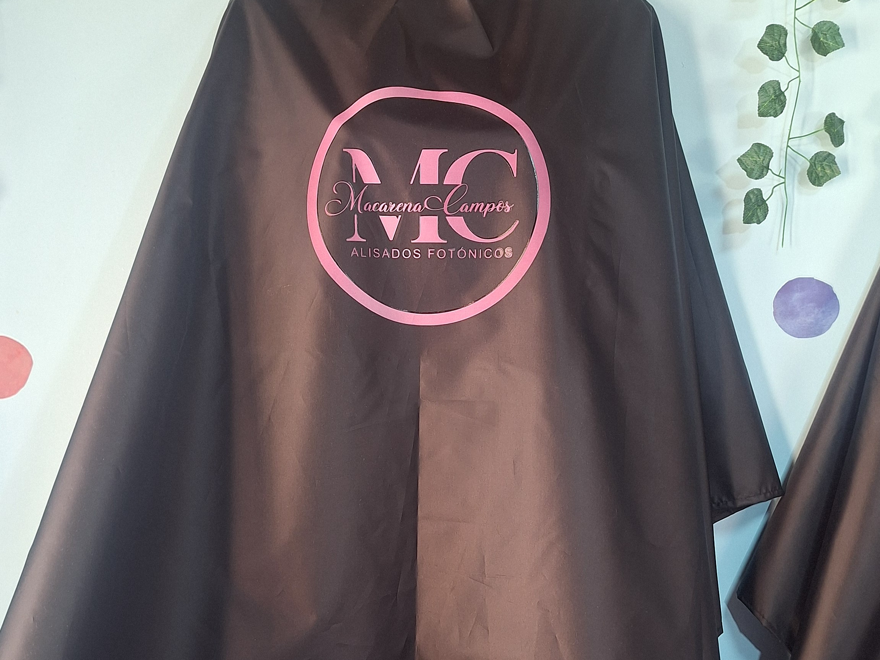 Capas de peluquería antifluidos 14