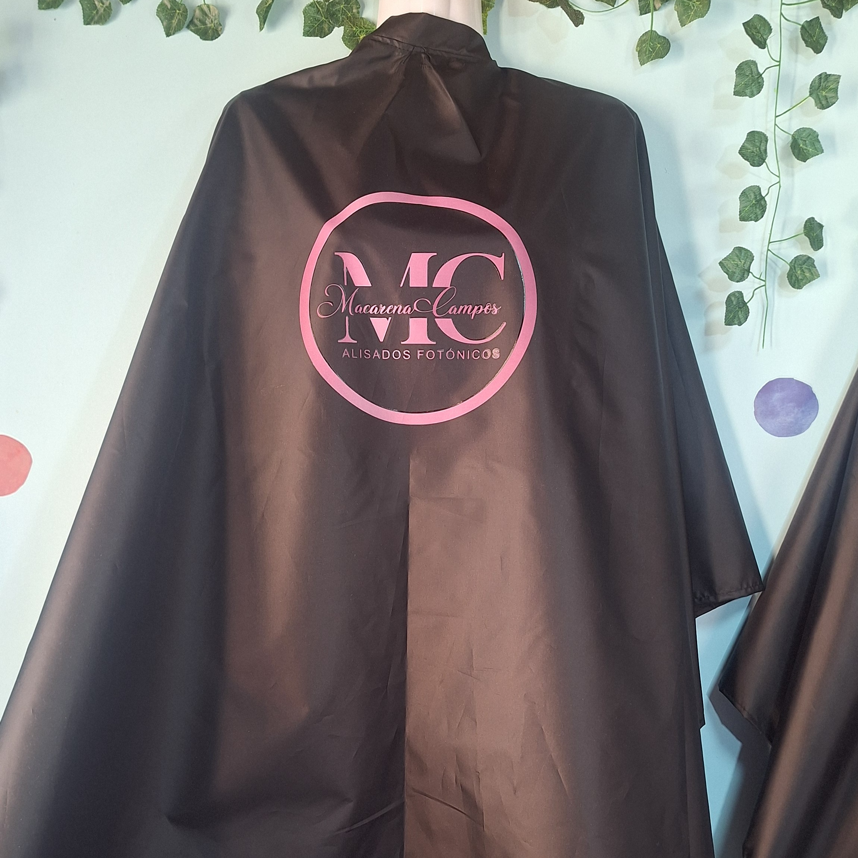 Capas de peluquería antifluidos 14