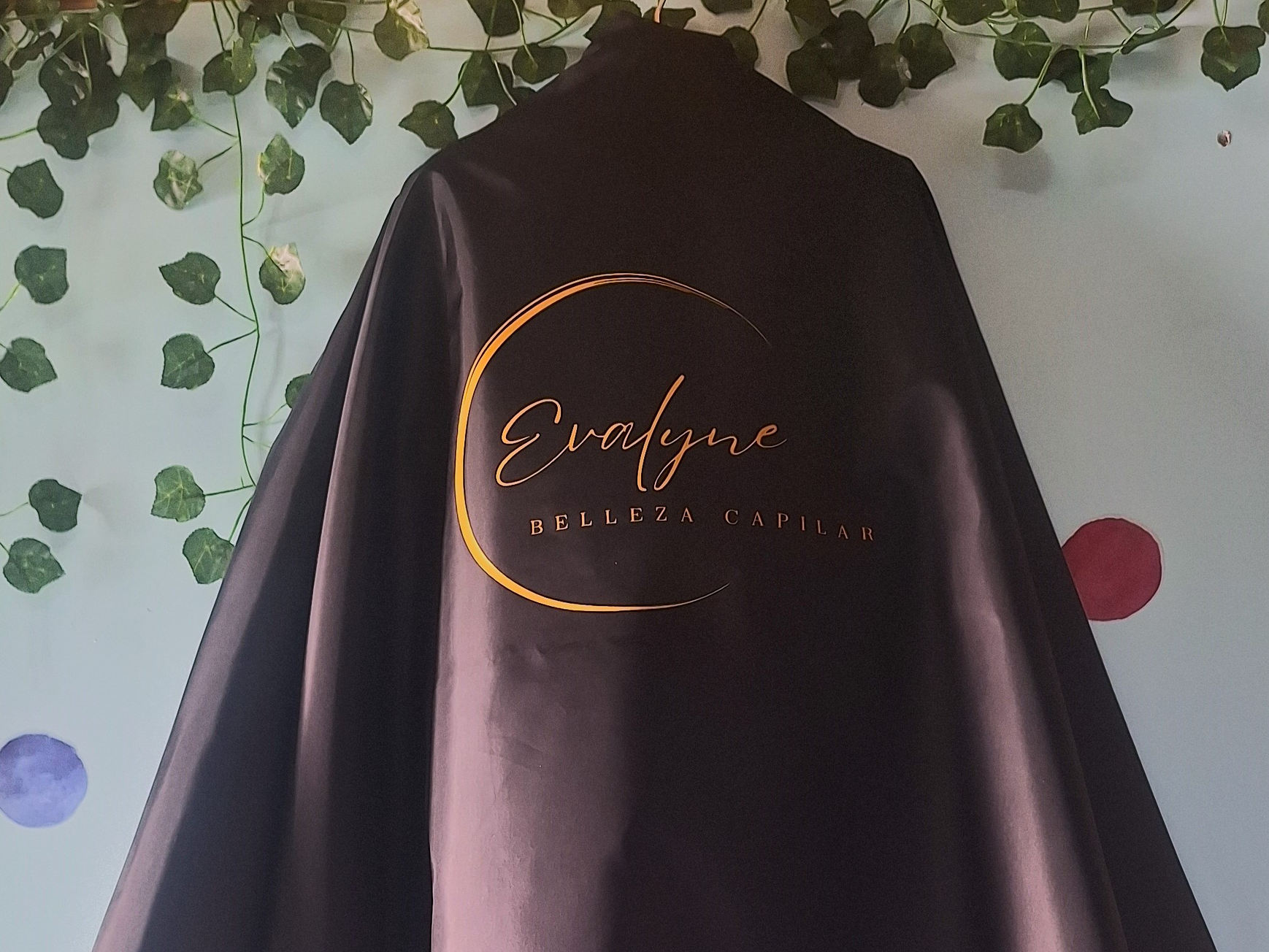 Capas de peluquería antifluidos 11