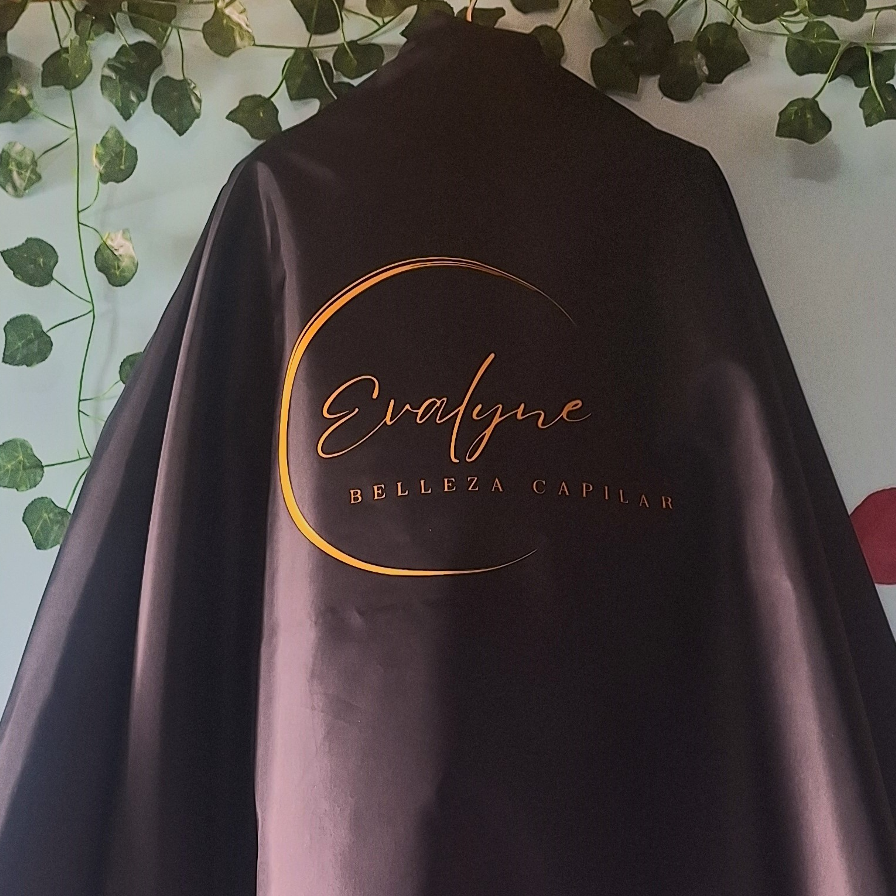 Capas de peluquería antifluidos 11