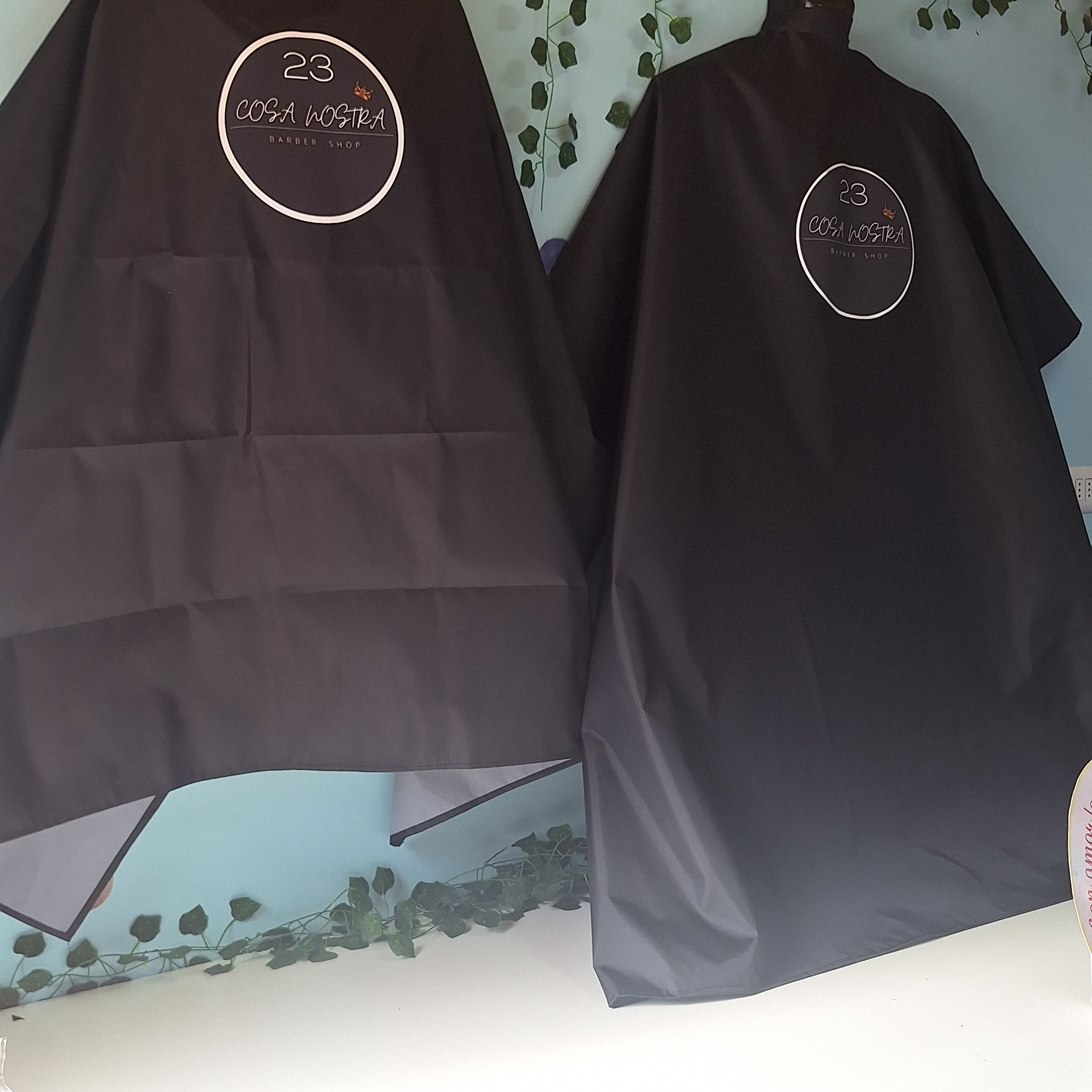 Capas de peluquería antifluidos 17