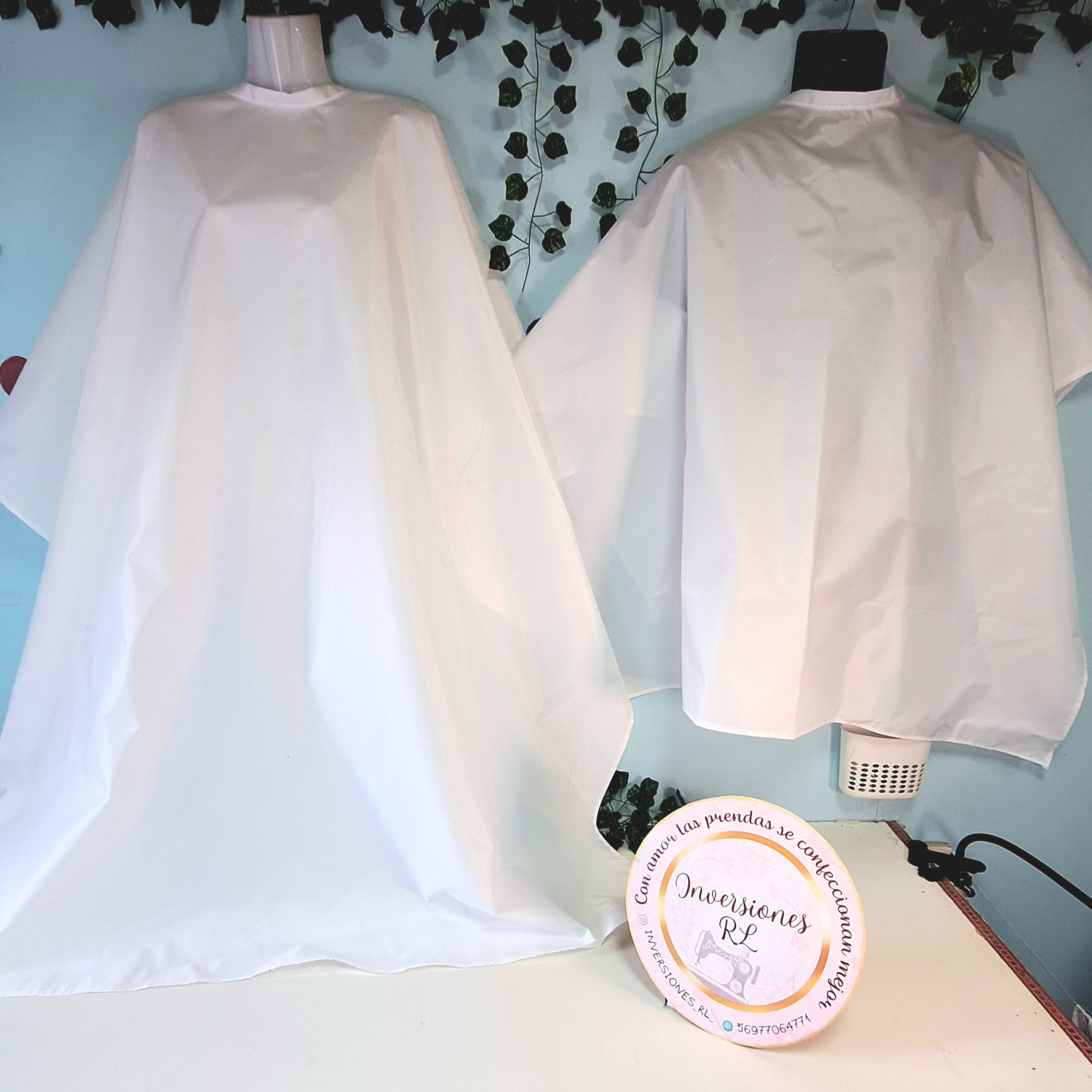 Capas de peluquería antifluidos 18