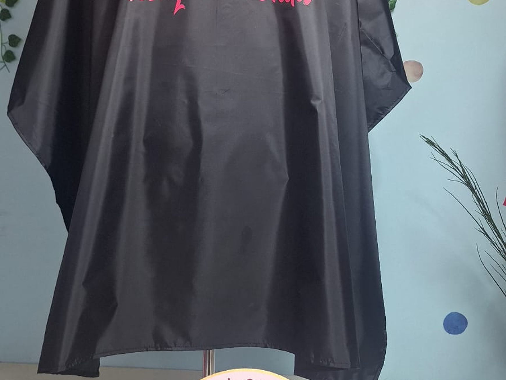 Capas de peluquería antifluidos 19