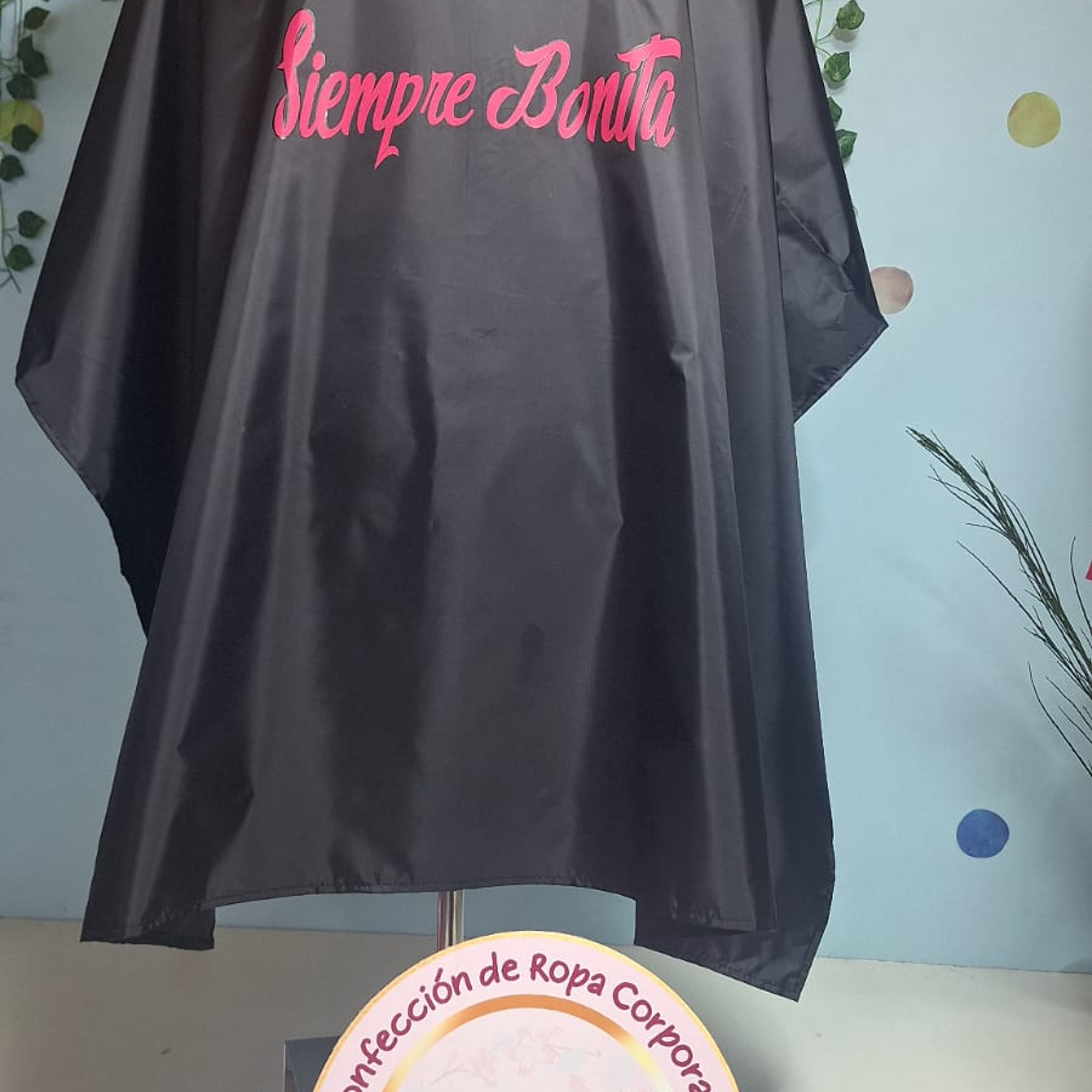 Capas de peluquería antifluidos 19