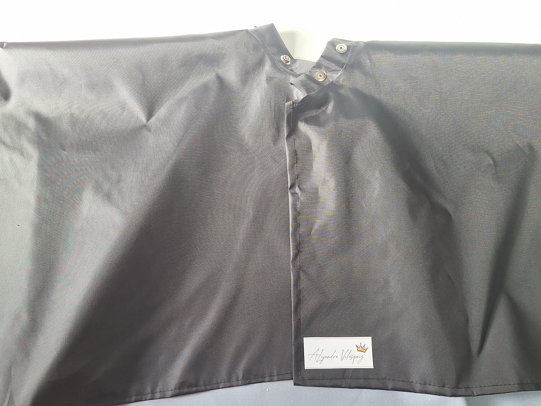 Capas de peluquería antifluidos-Negra 4